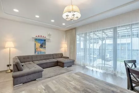 Stage living rooms to feel spacious and inviting.